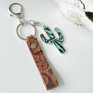 Western vintage leather cactus keychain with turquoise metal charm and floral embossing