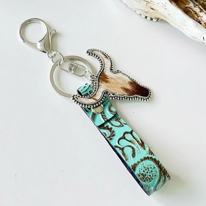 Western style leather keychain with silver bull head charm and embossed turquoise lanyard