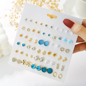 Detailed collection of 30 pairs assorted geometric earrings with pearls and crystals