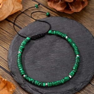 Bohemian forest green stone beaded bracelet with silver spacers and adjustable black cord