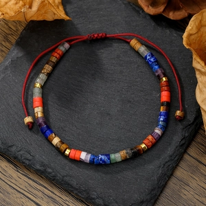 Handmade Bohemian beaded bracelet with natural imperial stones and adjustable red cord