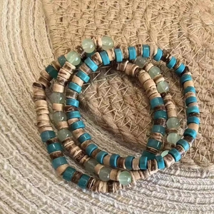 Set di tre bracciali elasticizzati bohémien con pietre naturali e perline di legno