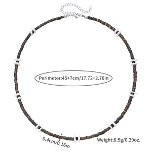 Detailed view of bohemian beaded necklace with wood, coconut shell, and lobster clasp