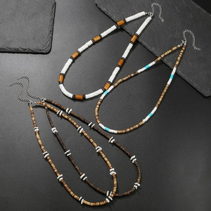 Bohemian heishi bead necklace set with wood, coconut shell, and stainless steel clasp