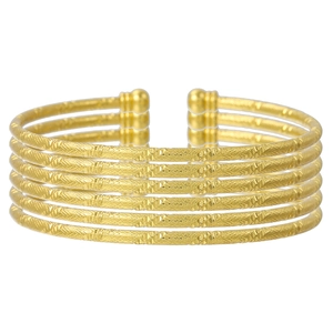 Set van zes vergulde open armbanden met diamanttextuur en bolle uiteinden voor dames