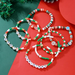Christmas beaded bracelet set with Santa and snowman charms in festive red and green