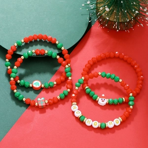 Christmas beaded bracelet set with Santa, Xmas tree charms and HO HO HO letter beads