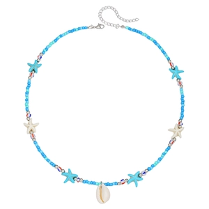Detail of bohemian layered beaded necklace featuring blue stars and natural seashell pendant