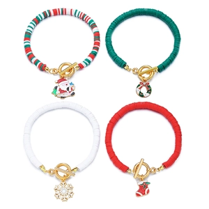 Close-up of Christmas bracelet set with clay beads, OT buckles, and festive charms