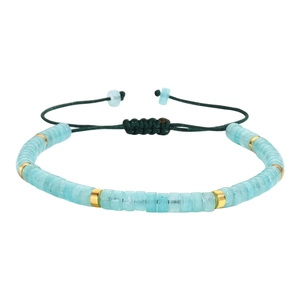 Detail of adjustable braided bracelet with light blue stone beads and golden spacers