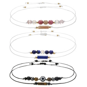 Detailed set of handmade woven cord bracelets with natural stones and evil eye beads
