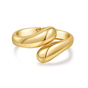 Minimalist gold snake-shaped open cuff bracelet with polished teardrop ends and hinge