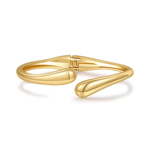Polished gold minimalist spring hinge bangle with elegant teardrop ends on white background