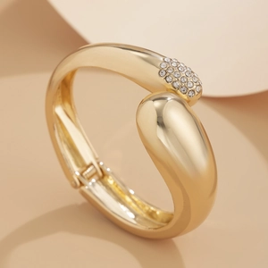 Chic gold irregular open cuff bracelet with pavé rhinestones on elegant geometric base