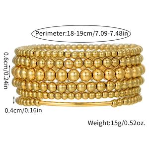 Detalle de pulsera de cuentas doradas de varias capas con medidas de 18-19 cm de largo