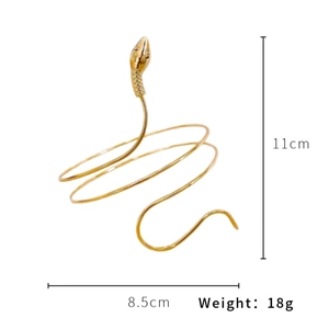 Detailed view of golden snake arm cuff with dimensions 11cm height and 18g weight