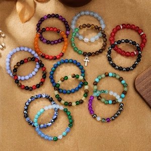 Assortiment van 8mm natuurlijke kristallen kralenarmbanden met Ankh-kruisbedeltjes
