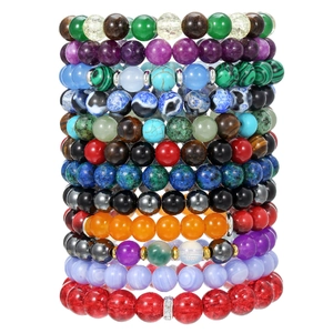 Set van 12 kleurrijke kralenarmbanden met natuurlijke kristallen en metalen kralen