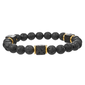 Detalle de cuentas de piedra de lava con espaciadores dorados mate en pulsera hombre