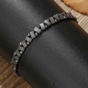 Minimalistische hematiet stretch armband voor heren met grijze schakels en gefacetteerde kralen