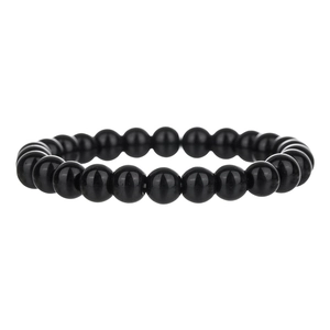 Macro di perle in agata nera lucida su un bracciale elastico unisex in stile etnico
