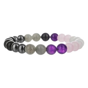 Macro detail of elastic beaded bracelet with rose quartz and amethyst gemstones