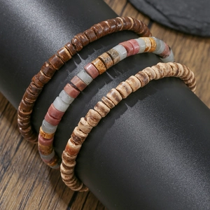 Three-piece stackable men's beaded bracelet set featuring natural wood and stone beads