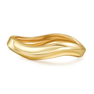 Minimalist wide gold wave bangle with a polished mirror finish and geometric metal design