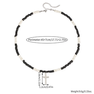 Detail of bohemian wood bead necklace with stainless steel cross and size specifications
