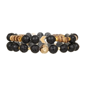Volcanic lava stone and wood bead bracelet set with golden charms and arrow pendant