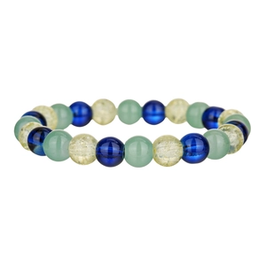Close-up of beaded bracelet with dark blue, light green and cracked yellow glass beads