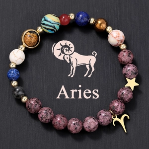 Detailed shot of Aries natural stone beaded bracelet with cosmic star and planet charms