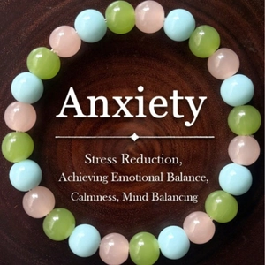 Elegant beaded couple bracelet with natural blue, pink, and green healing crystal stones
