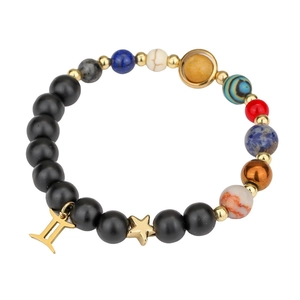 Detail of solar system beaded bracelet with natural stones and Gemini zodiac charms