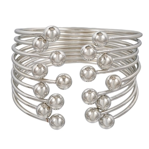 Polished silver multilayer open bangle featuring stylish geometric spherical ends