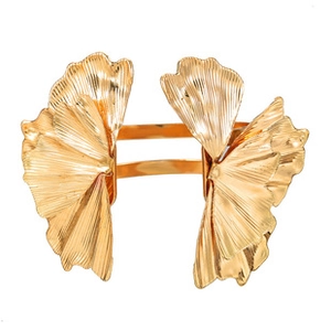 Detailed view of wide gold ginkgo leaf cuff bracelet with radial pleated textures