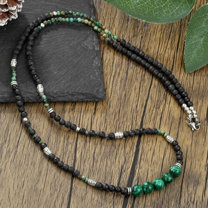 Handmade bohemian beaded necklace with black lava stone and green turquoise gemstones