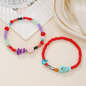 Bracelets de plage d'été colorés avec poissons en céramique et perles de verre vives