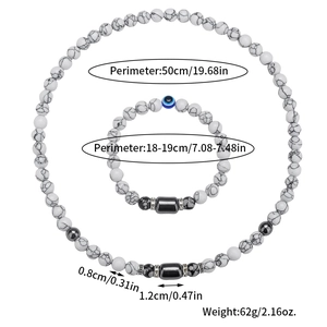 Conjunto de collar y pulsera de turquesa blanca y hematita con dije de ojo turco azul