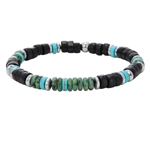 Retro beaded bracelet with black wood discs, blue turquoise and green stones on white background