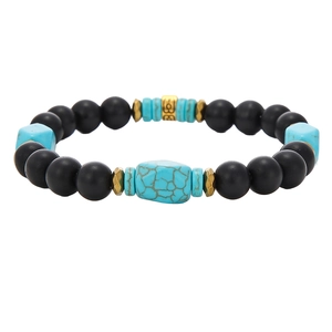 Pulsera de hombre con cuentas negras mates, detalles turquesas y separadores dorados vintage