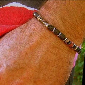 Elastic natural lava stone bead bracelet with metal spacers for a raw style look
