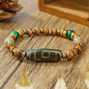 Retro Armband im tibetischen Stil mit grünen Dzi-Perlen und Tigerauge-Steinen