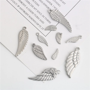 Lot de 8 breloques ailes de plumes en acier inoxydable pour création de bijoux DIY