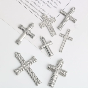 Polished stainless steel cross pendants in various textured designs for DIY jewelry
