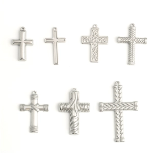 Set of seven stainless steel cross pendants with diverse textures for DIY jewelry making