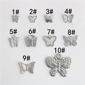 Collection de dix pendentifs papillon en acier inoxydable pour la création de bijoux DIY