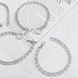 Macro shot of silver stainless steel NK link bracelets with OT clasp and lobster clasp