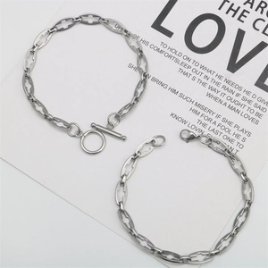 Bracelet croix fait main en acier inoxydable avec fermoirs à bascule et homard