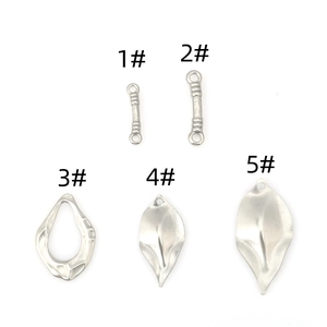 Detailed set of five unique stainless steel leaf pendants and jewelry connectors
